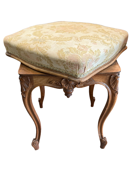 Tabouret de style Louis XV en bois sculpté, assise pivotante à motifs floraux