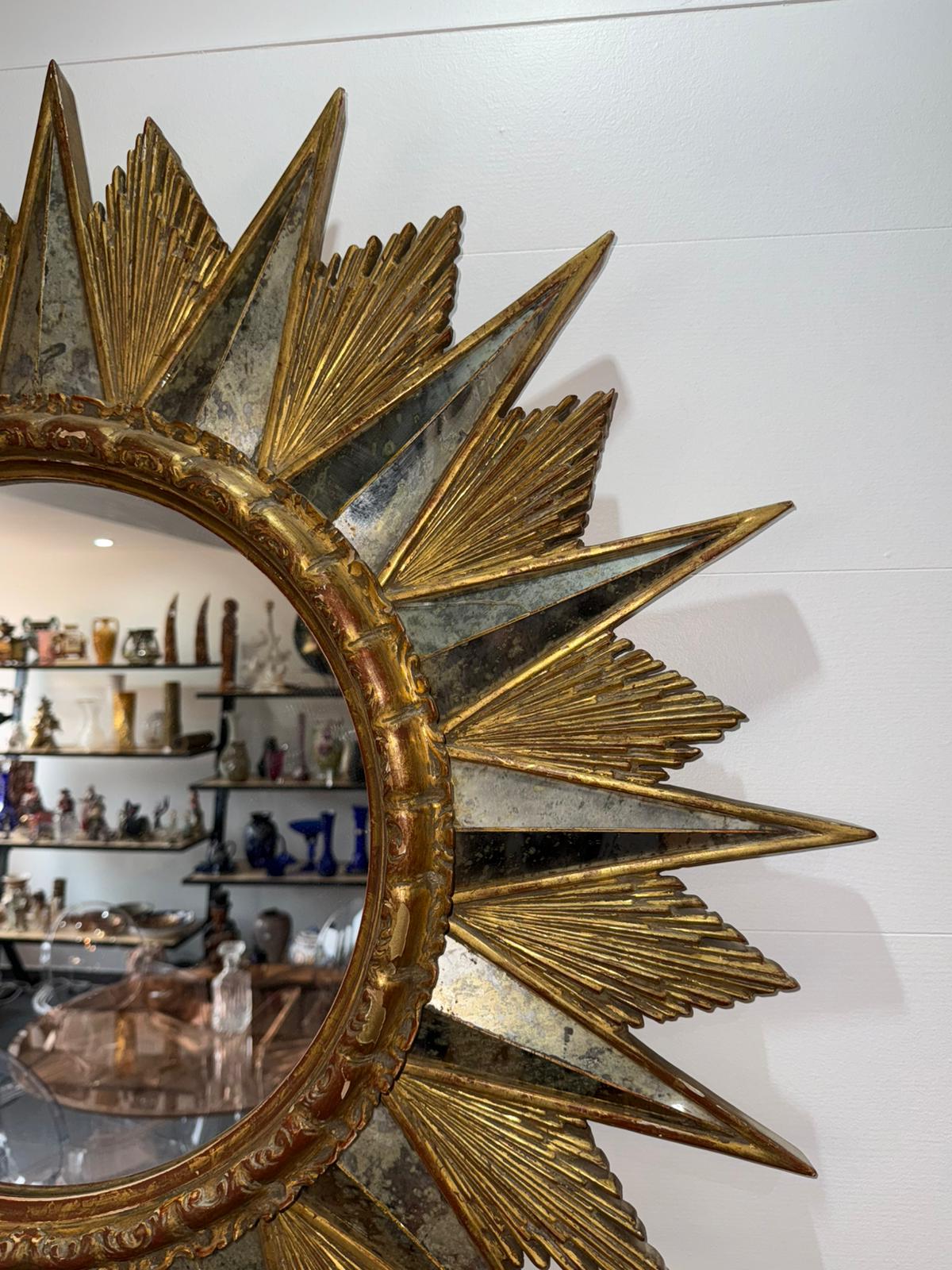 Miroir soleil doré à rayons en bois vintage