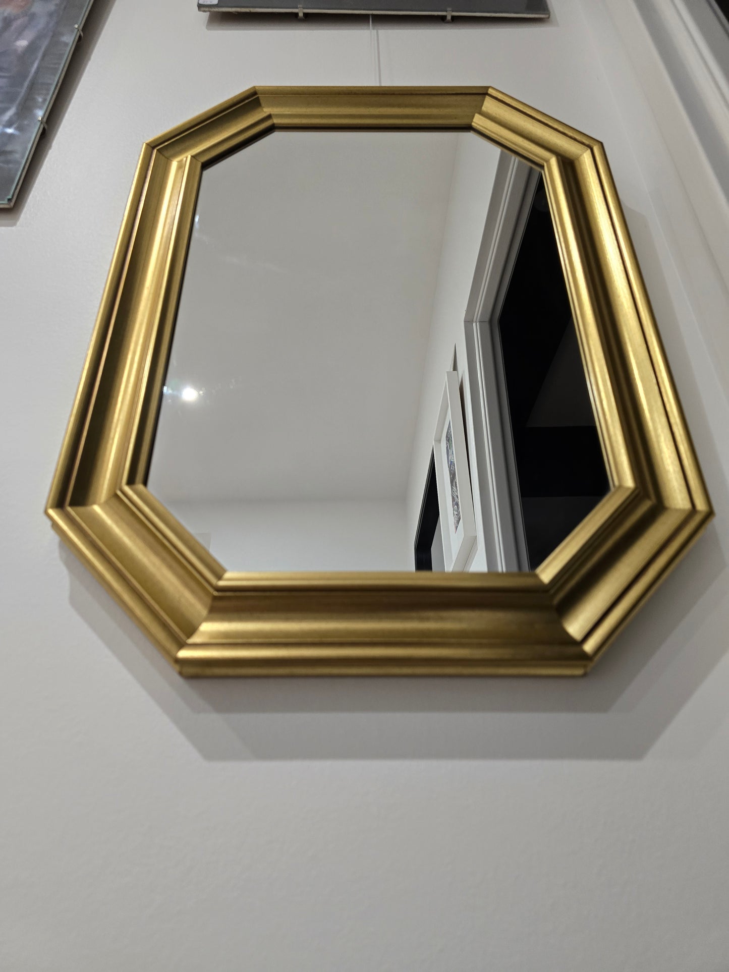 Miroir octogonale doré