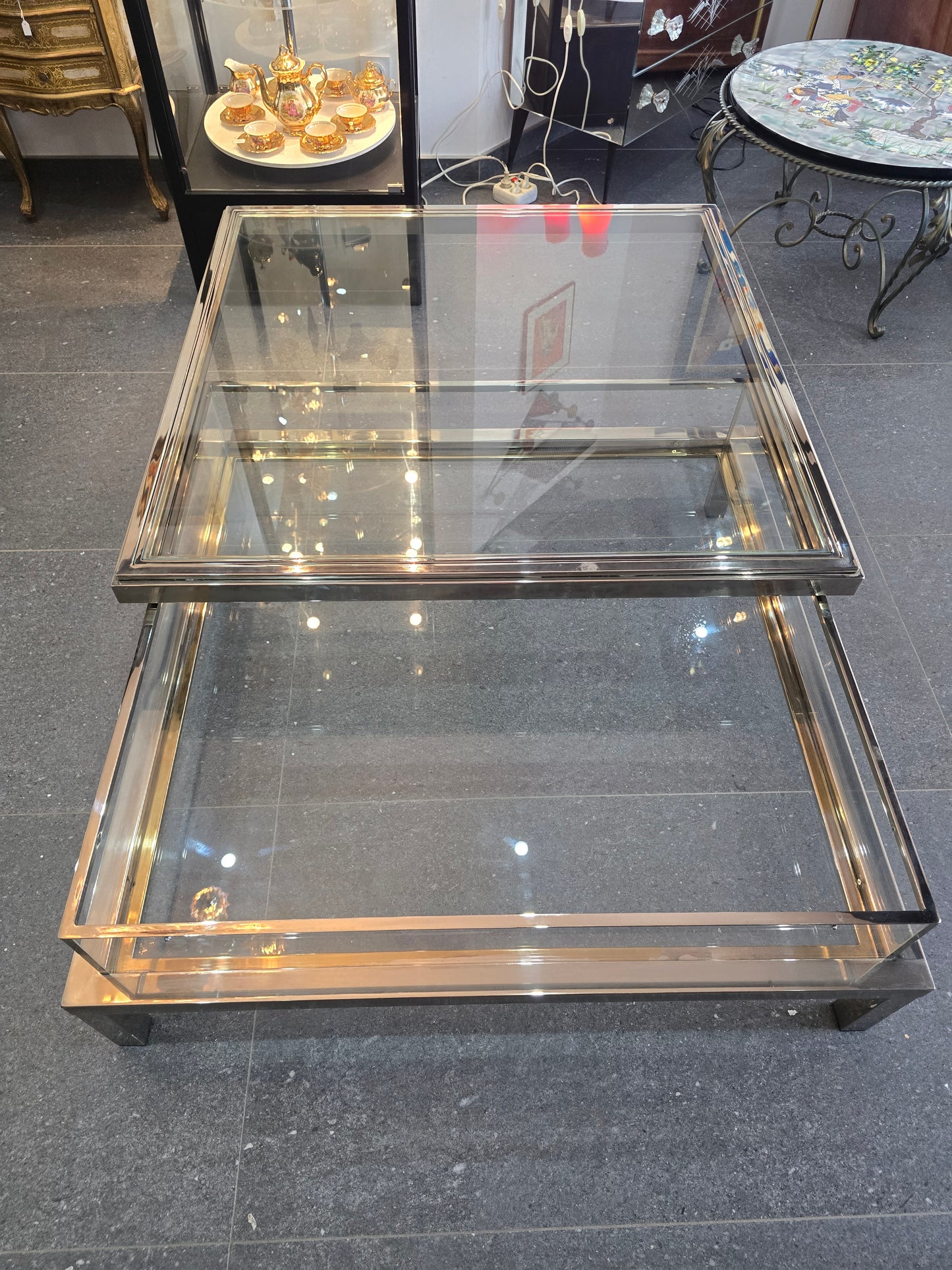 Table basse à plateau coulissant – Design 70 – Chrome & verre – 108 cm
